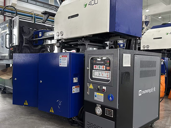 纽扣箱包扣生产注塑机模具油温机——应用案例